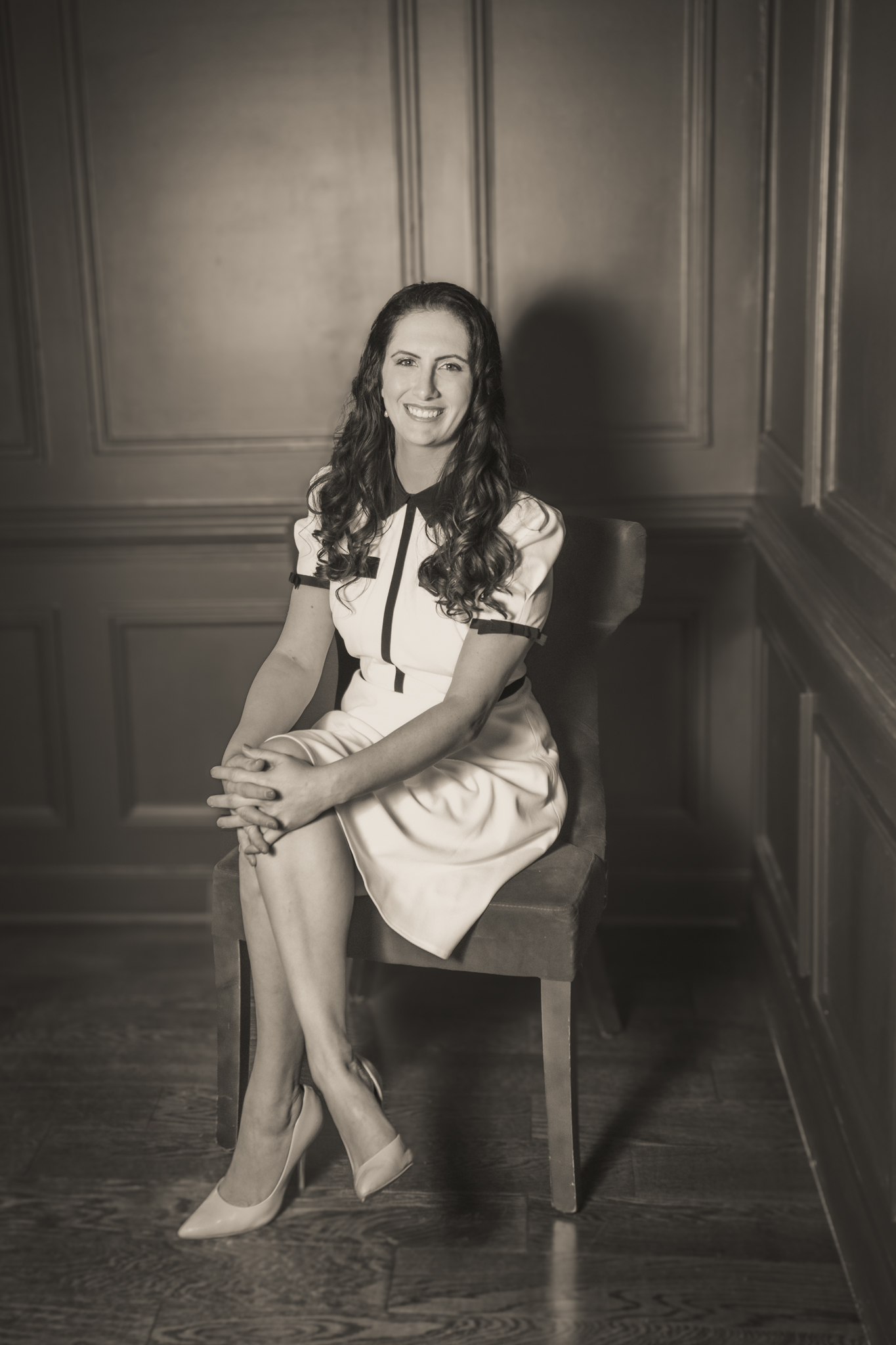 Brianna O’Keeffe, founder of Virginia Green Data Center Initiative, smiling in a seated portrait.